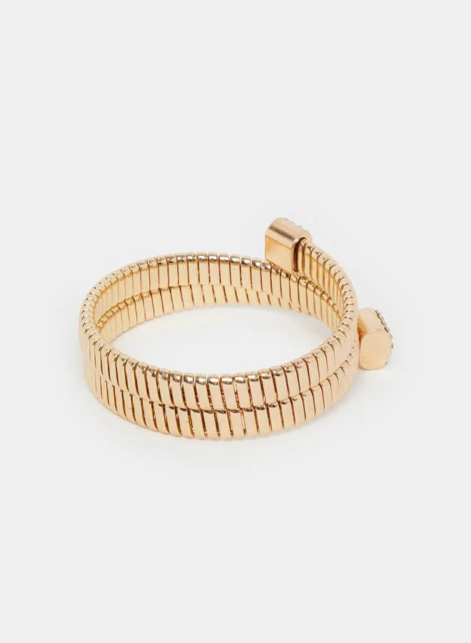 Styli Gold Tone Crystal Embellished Coil Bracelet